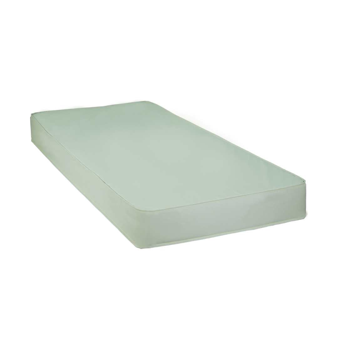 The ProBasics Firm Support Innerspring Mattress, shown in light green with squared corners and a fitted cover, provides firm support for homecare or medical use against a white background.
